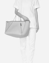 Load image into Gallery viewer, Guise tote bag in washed pale grey denim print
